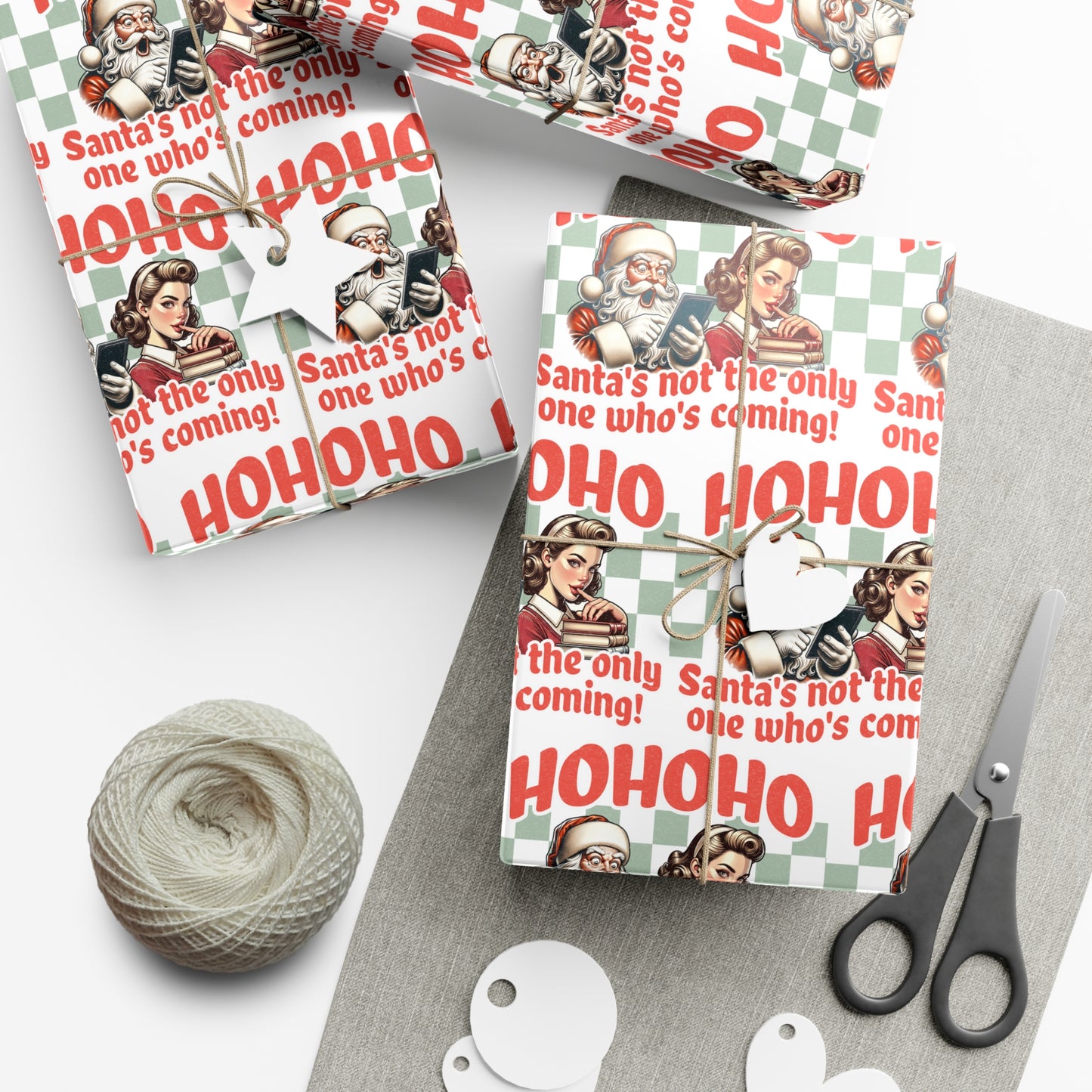 Funny Christmas Wrapping Paper for Readers of Romance Books with naughty bookish theme of Santa holding ereader behind Book Lover